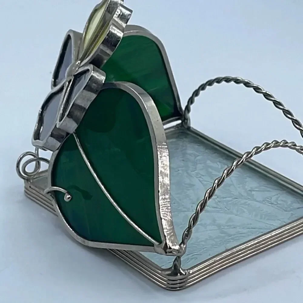 Stained glass leaded framed tea light holder.